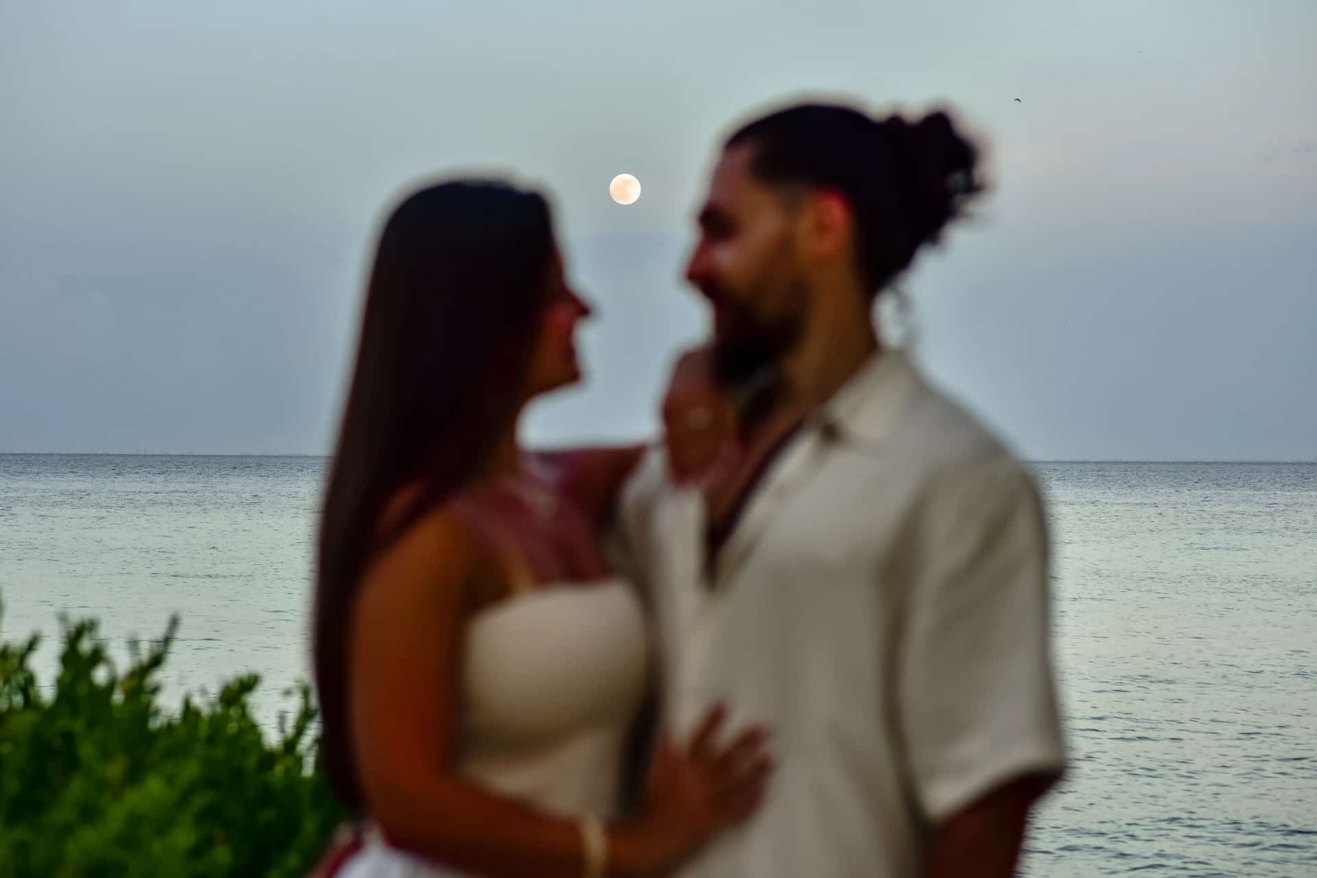 Couple embracing on a Tulum beach