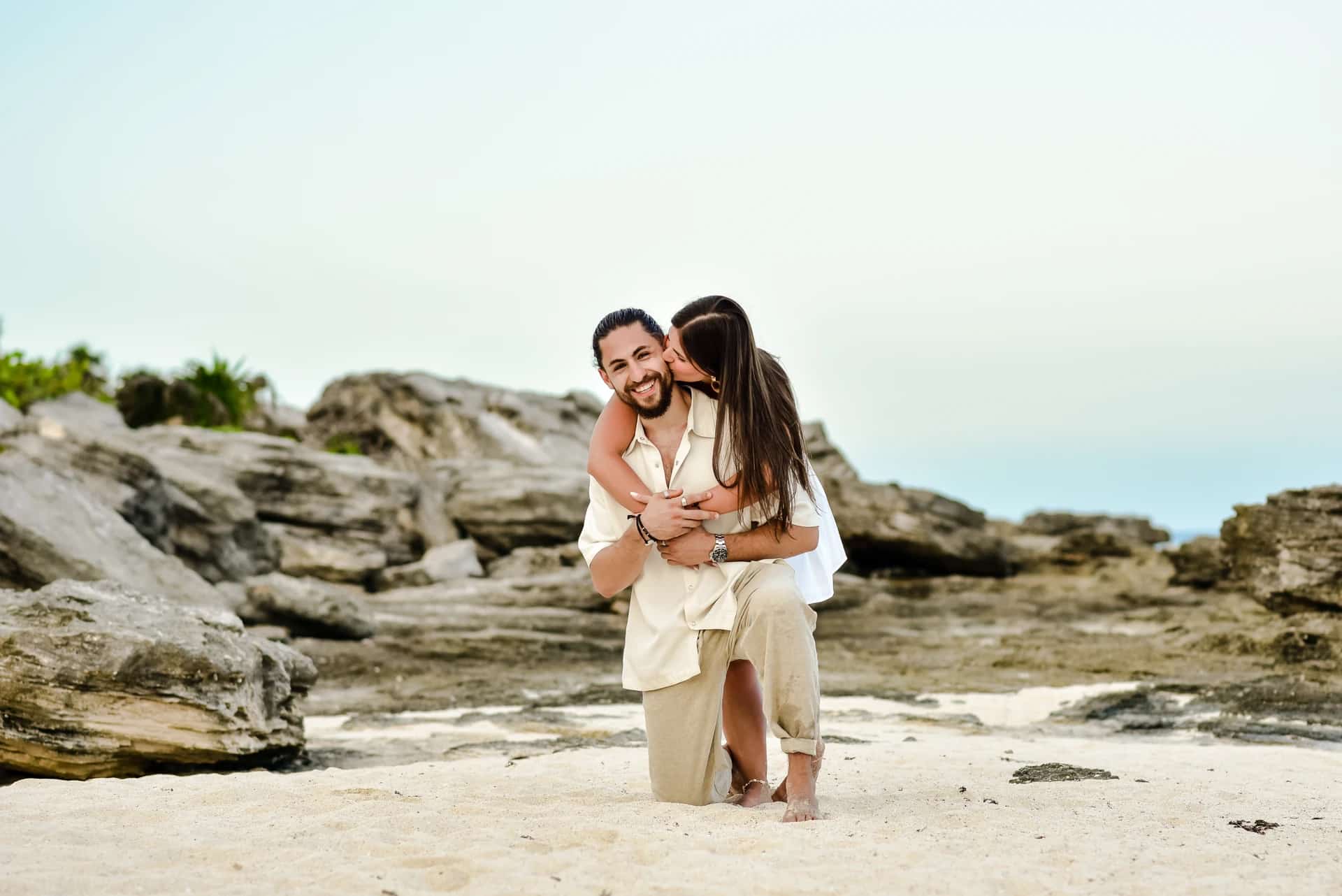 Couple by the sea in Tulum