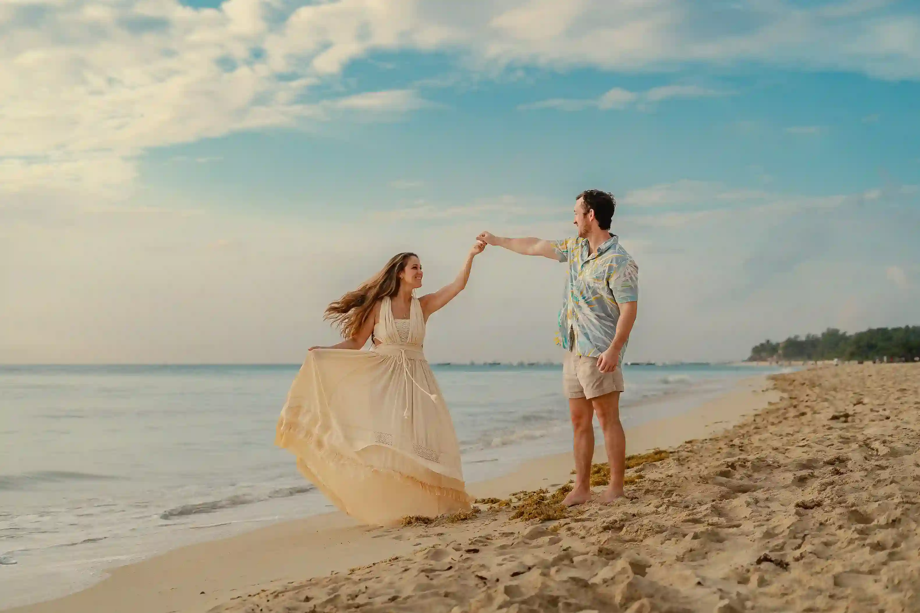 Close engagement portrait of a couple on the beach during an engagement photography session in Cancún