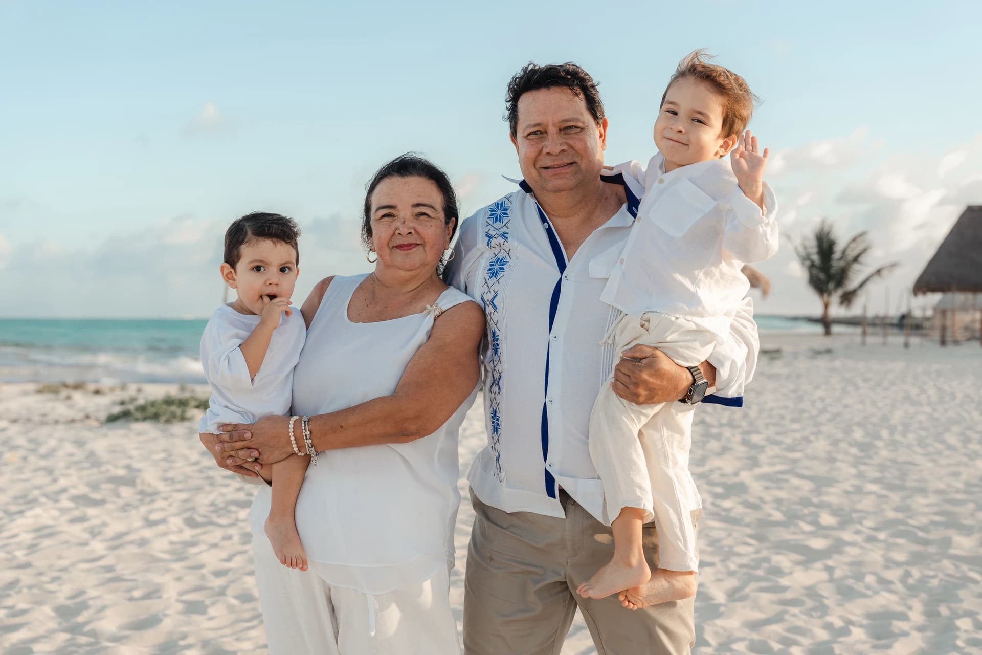 Parents with their child on the beach, Cancún