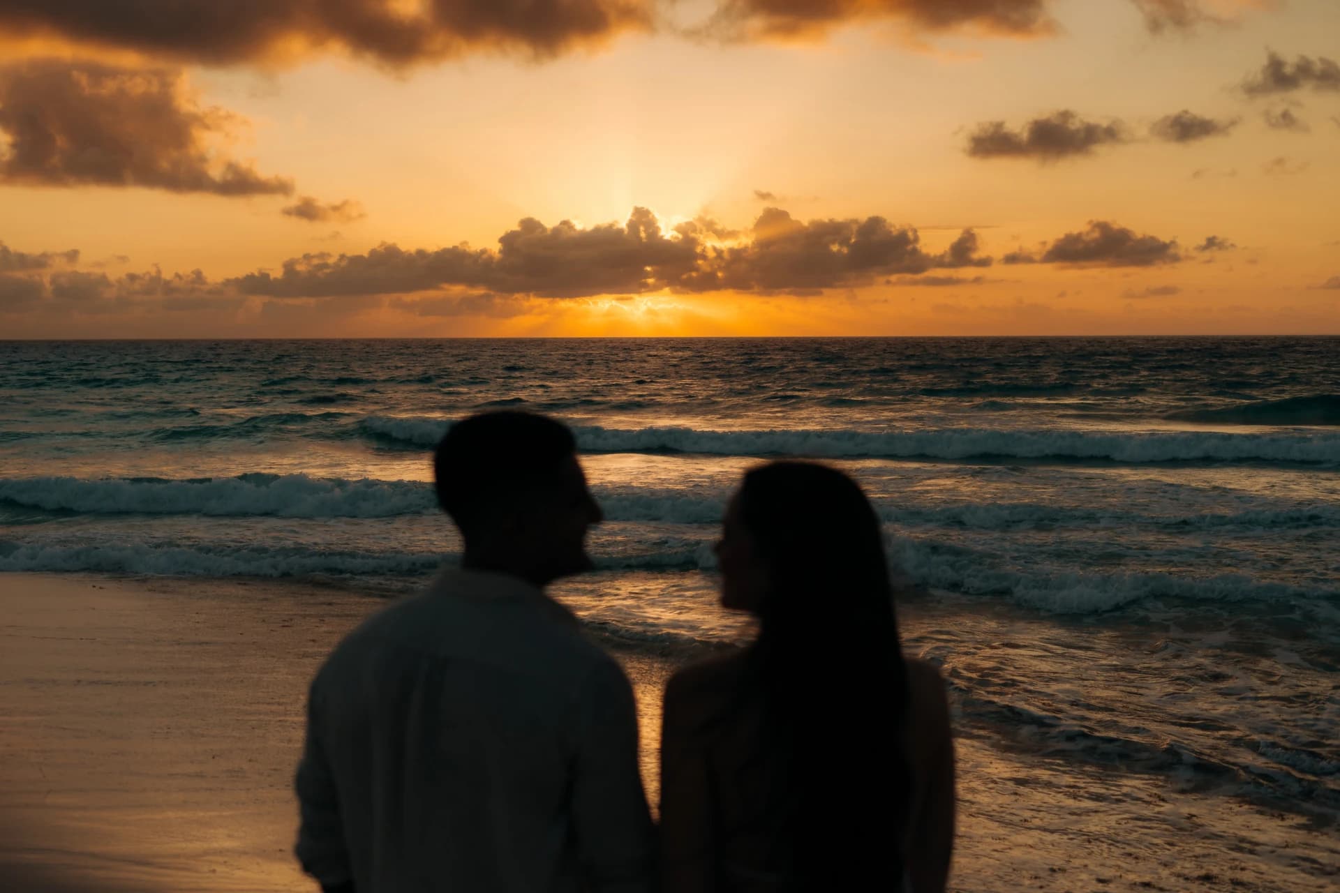 Couple silhouette at sunrise, Riviera Maya