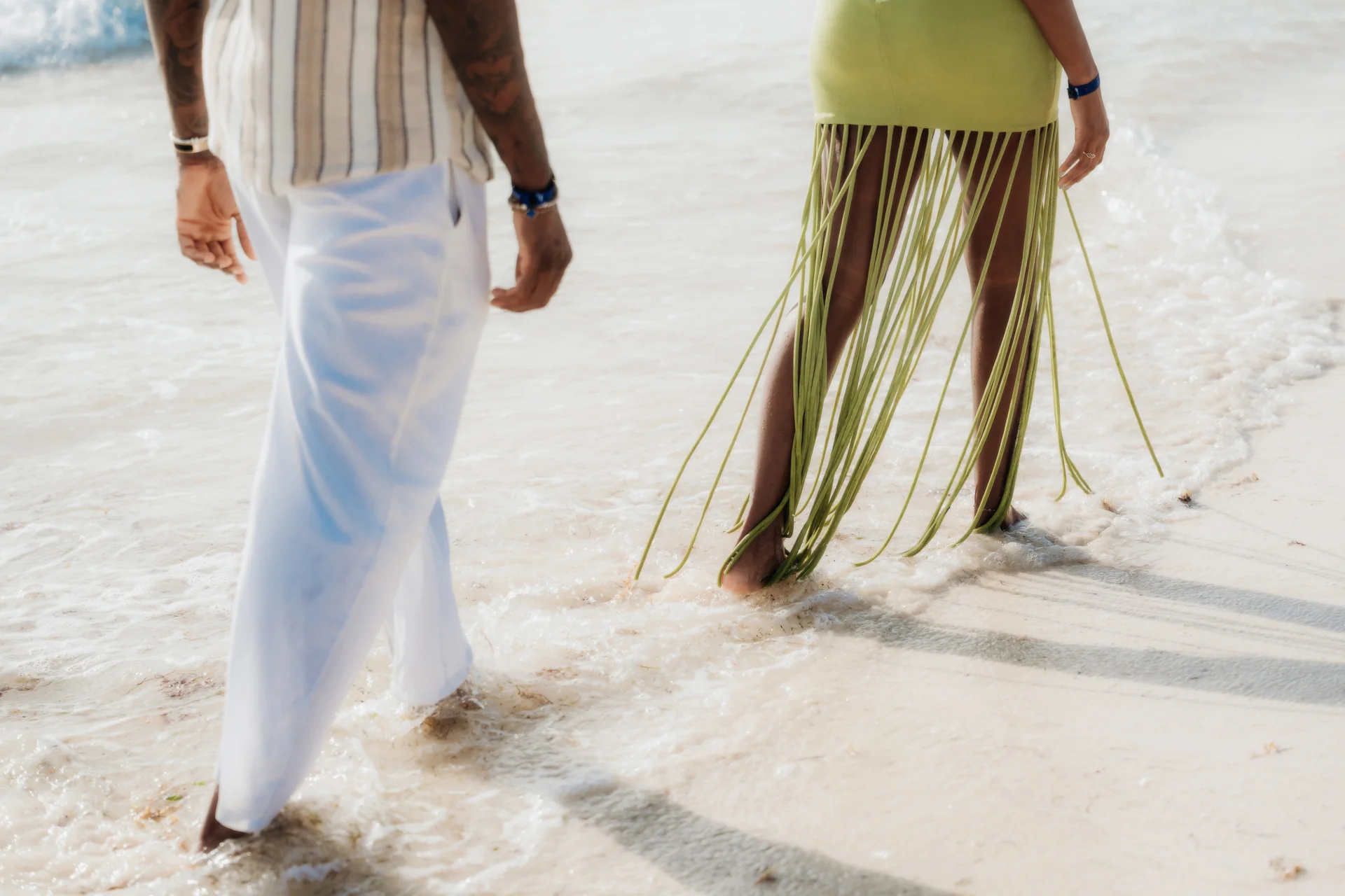 Couple twirling together on the sand, RIU Latino, Costa Mujeres