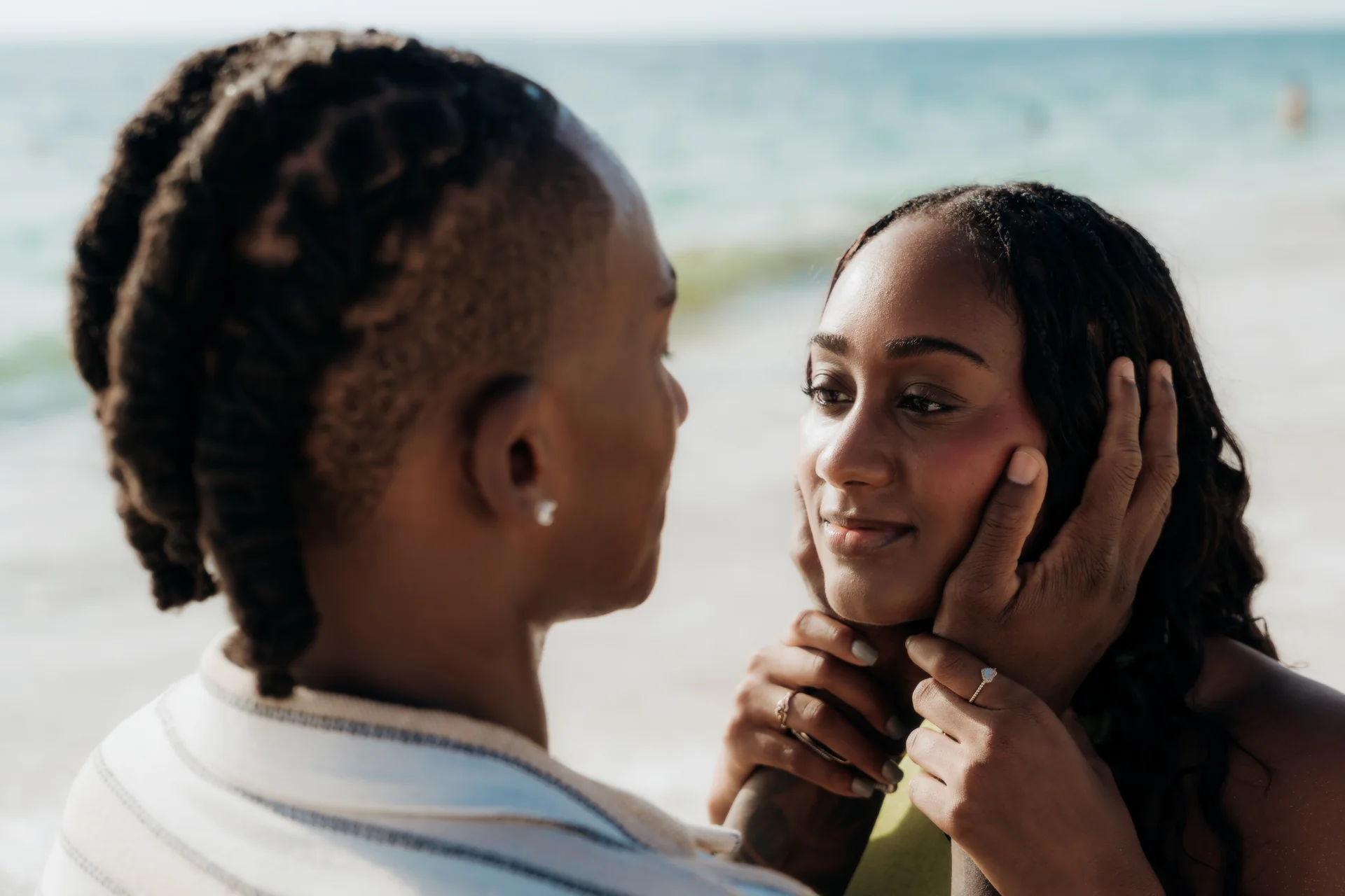 Couple wrapped in an embrace on the beach, RIU Latino, Costa Mujeres