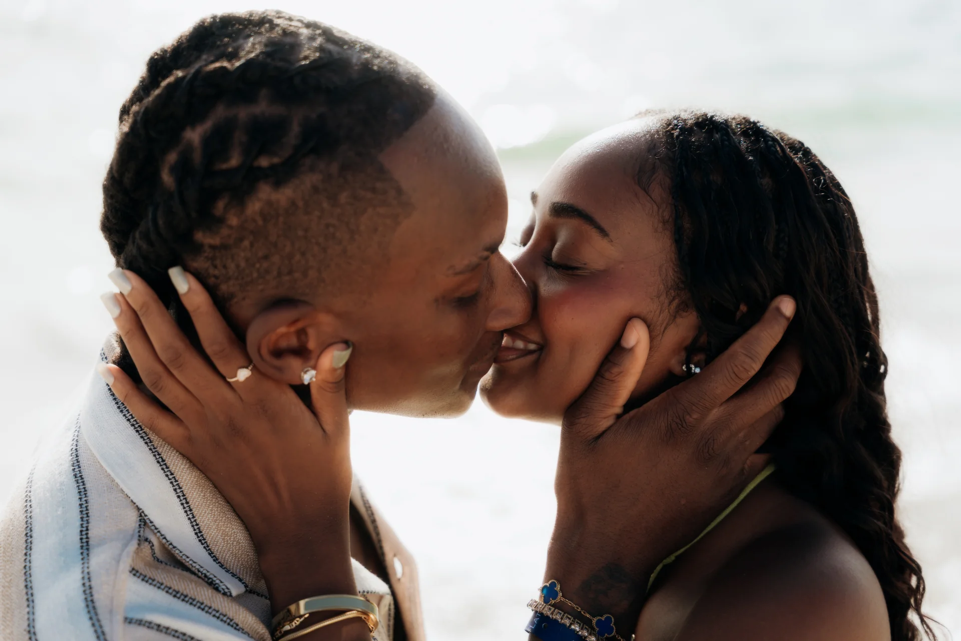 Couple leaning into each other on the sand, RIU Latino, Costa Mujeres