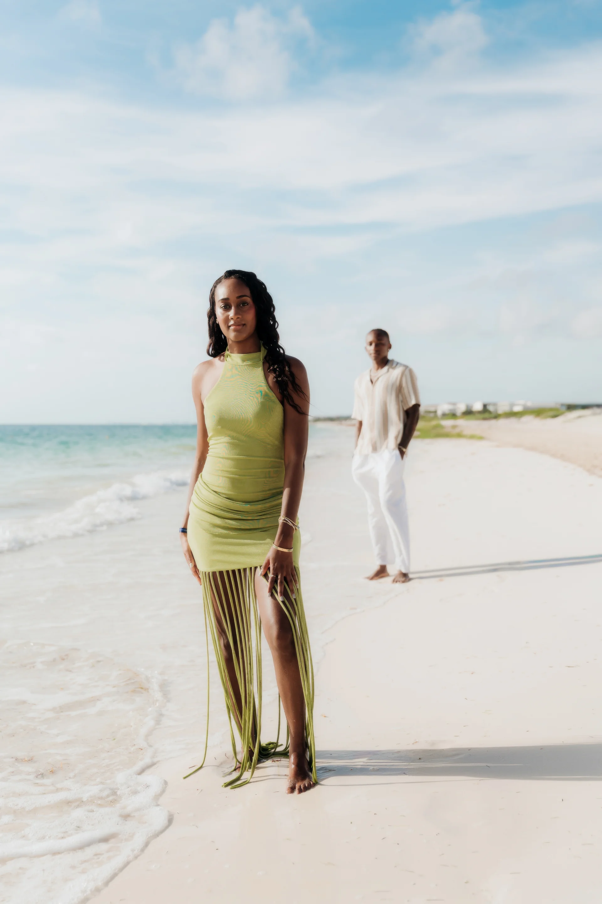 Couple holding each other close on the beach, RIU Latino, Costa Mujeres