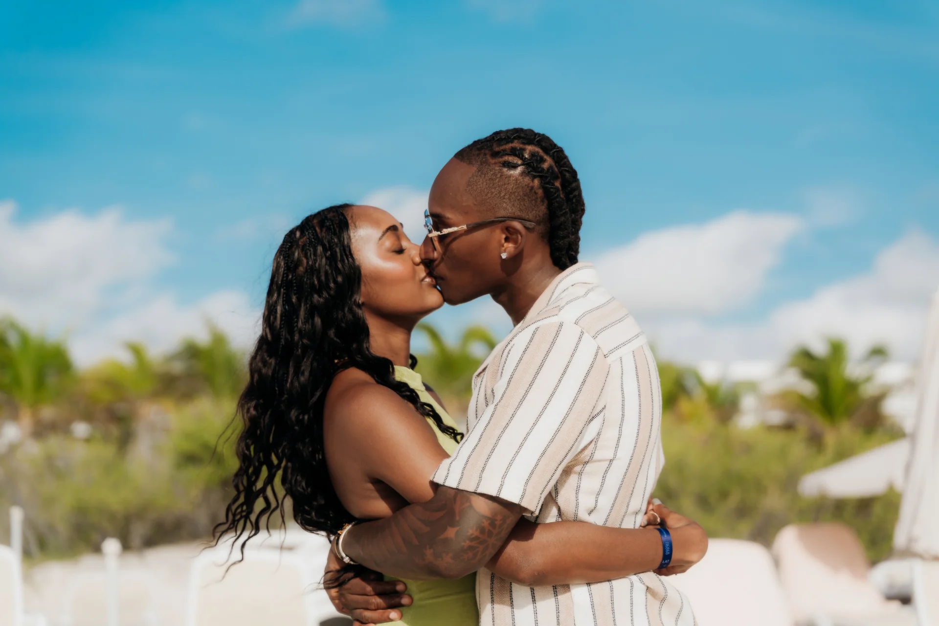 Couple sitting together on the sand, RIU Latino, Costa Mujeres