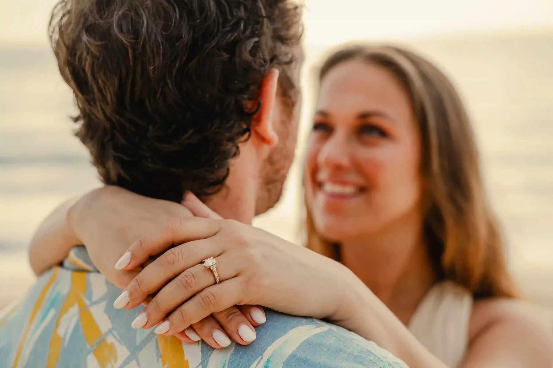 Close portrait of an engaged couple on the beach, Cancún