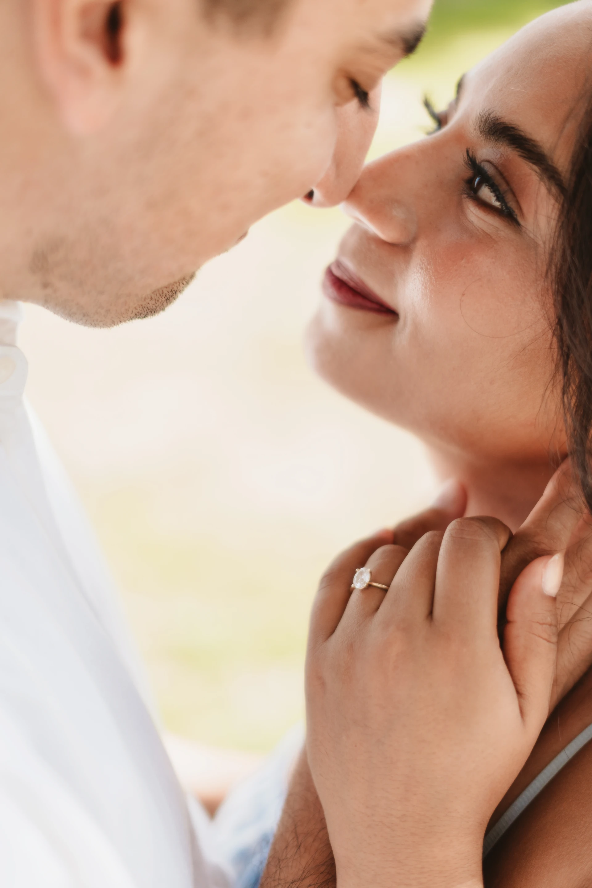 Engagement ring moment between a couple in the Riviera Maya