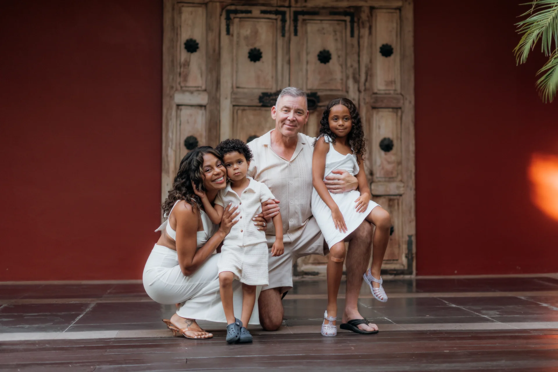 Family portrait with the ocean behind them, Banyan Tree Mayakoba, Riviera Maya