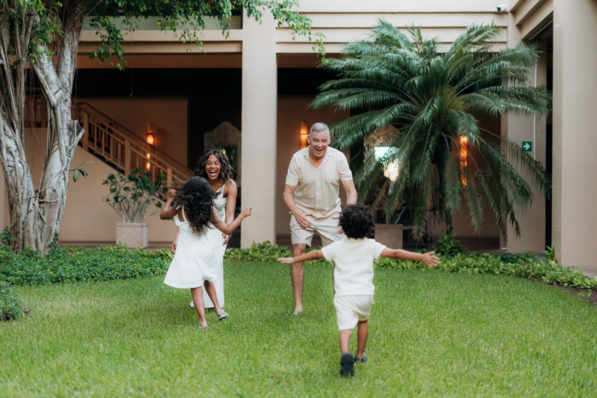 Family walking the garden path together, Banyan Tree Mayakoba, Riviera Maya