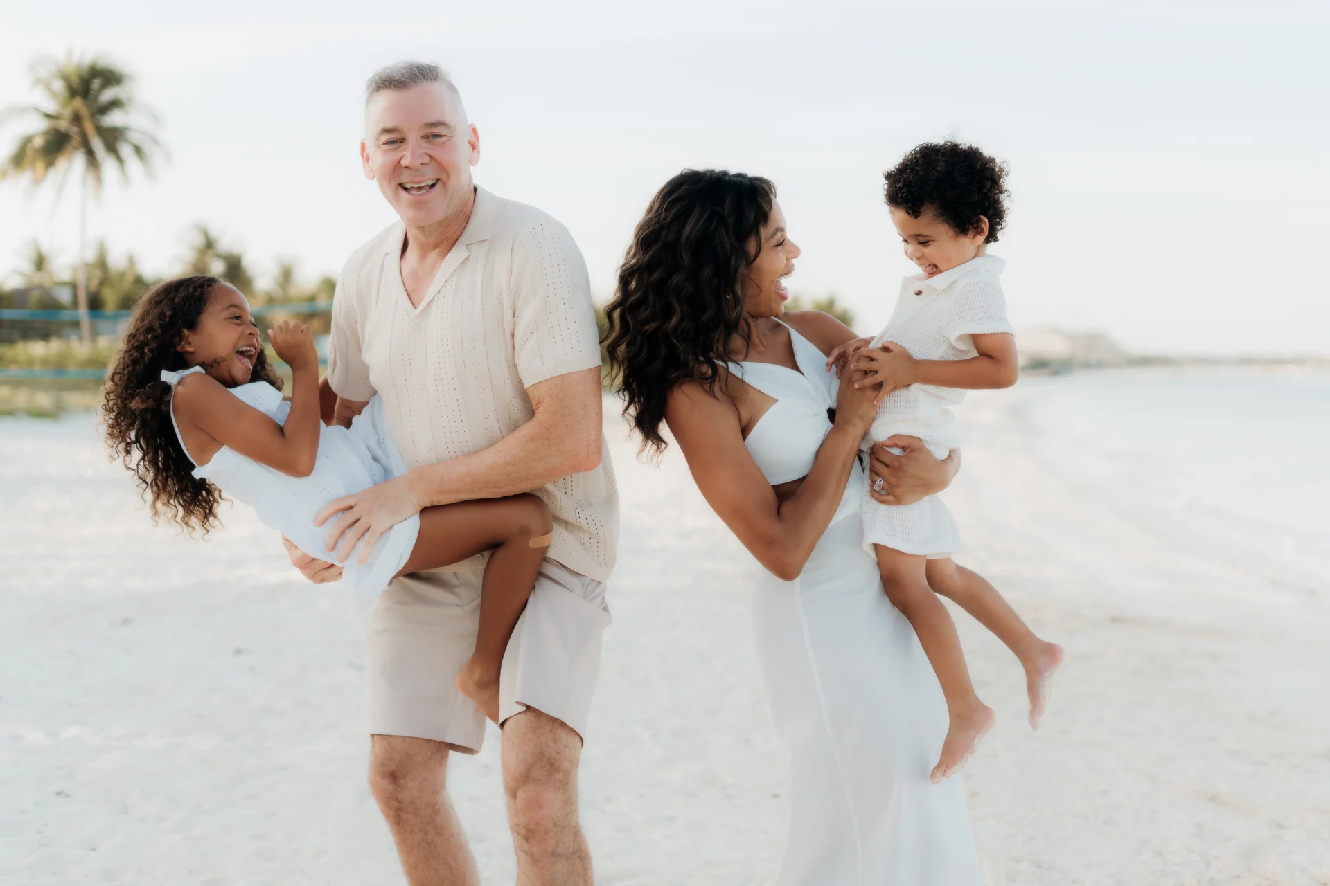 Father carrying his child on his shoulders, Banyan Tree Mayakoba, Riviera Maya