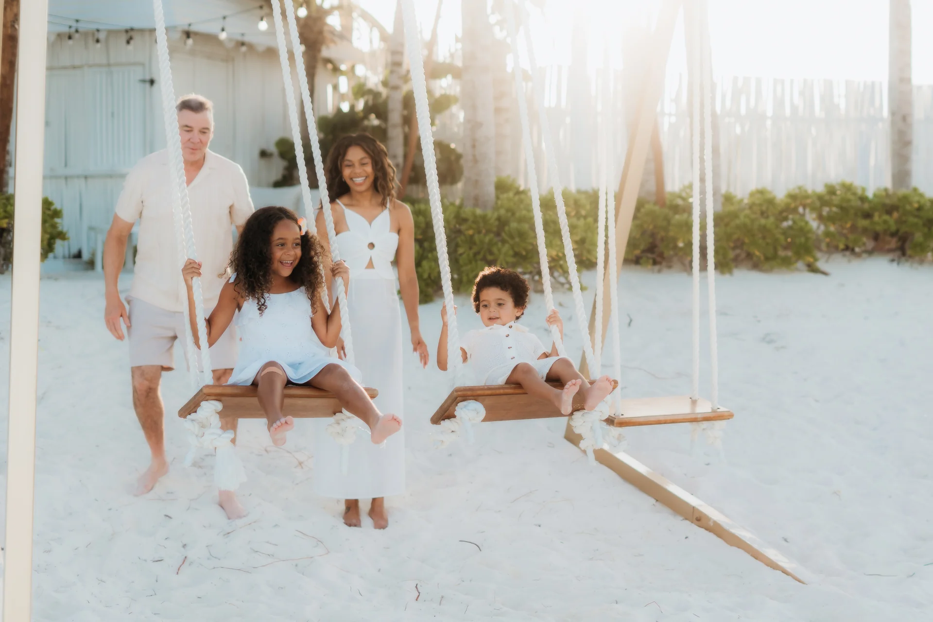 Family gathered close for a group portrait, Banyan Tree Mayakoba, Riviera Maya