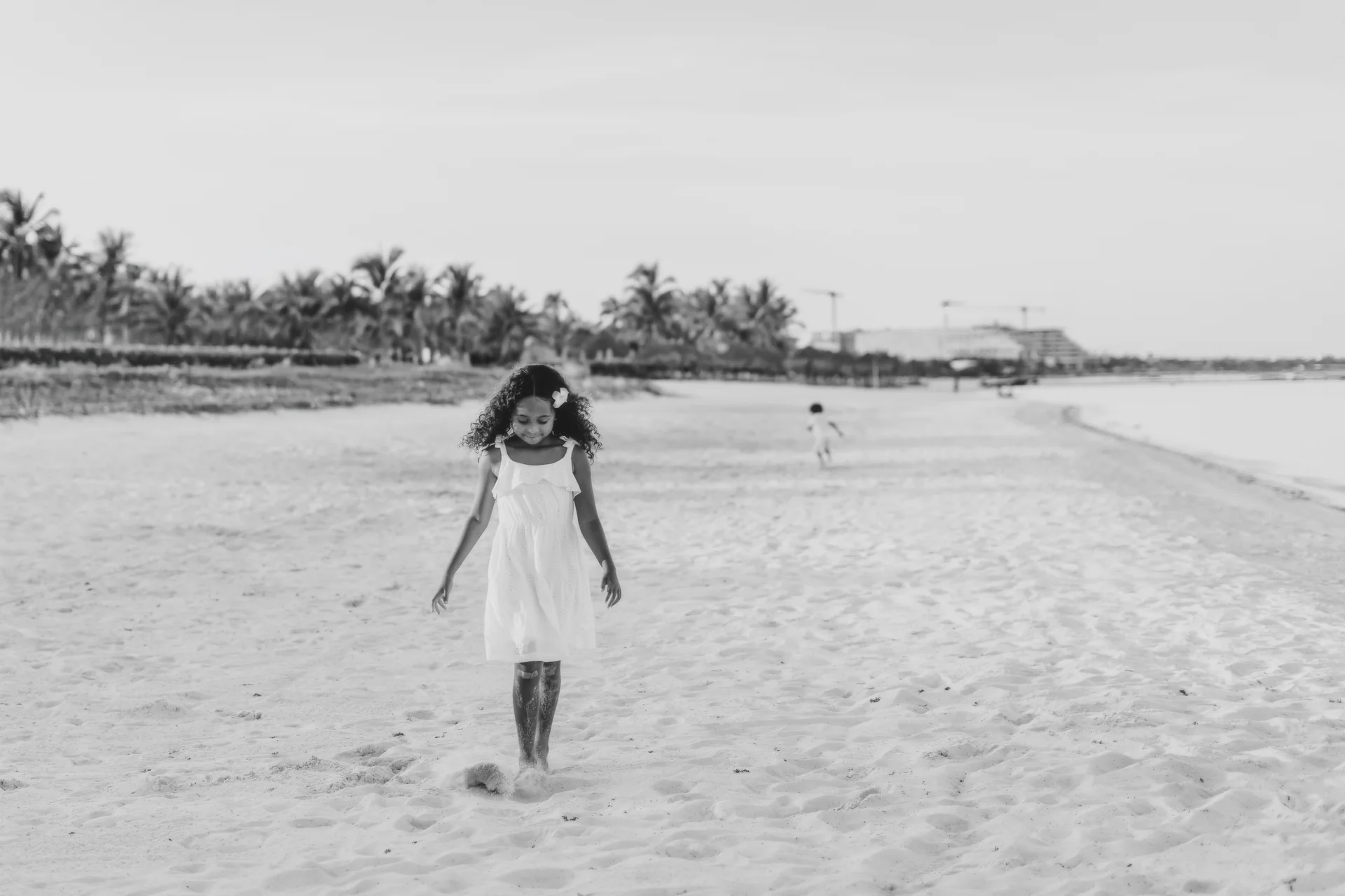 Father and child looking out at the sea, Banyan Tree Mayakoba, Riviera Maya