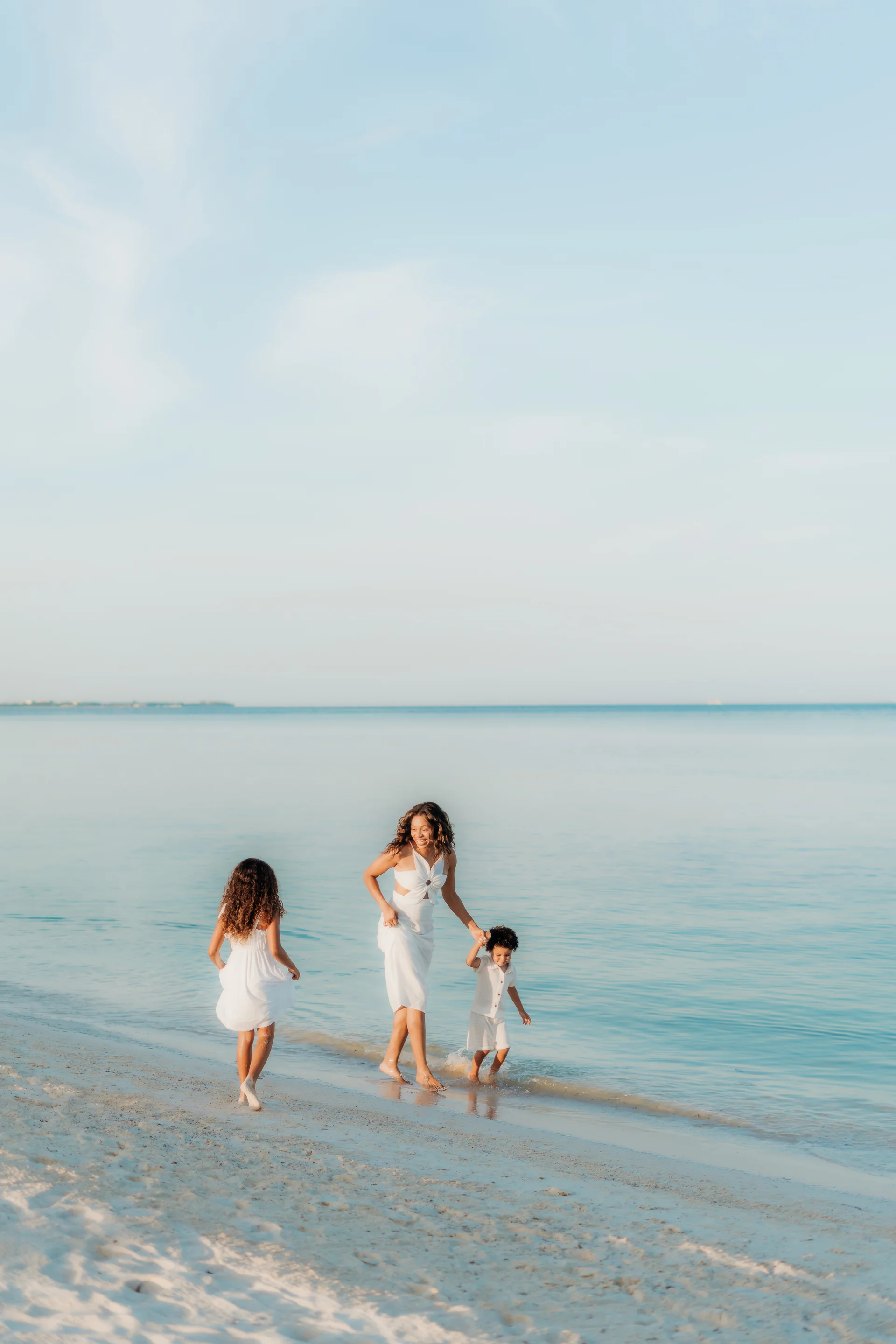 Family strolling through the resort gardens, Banyan Tree Mayakoba, Riviera Maya