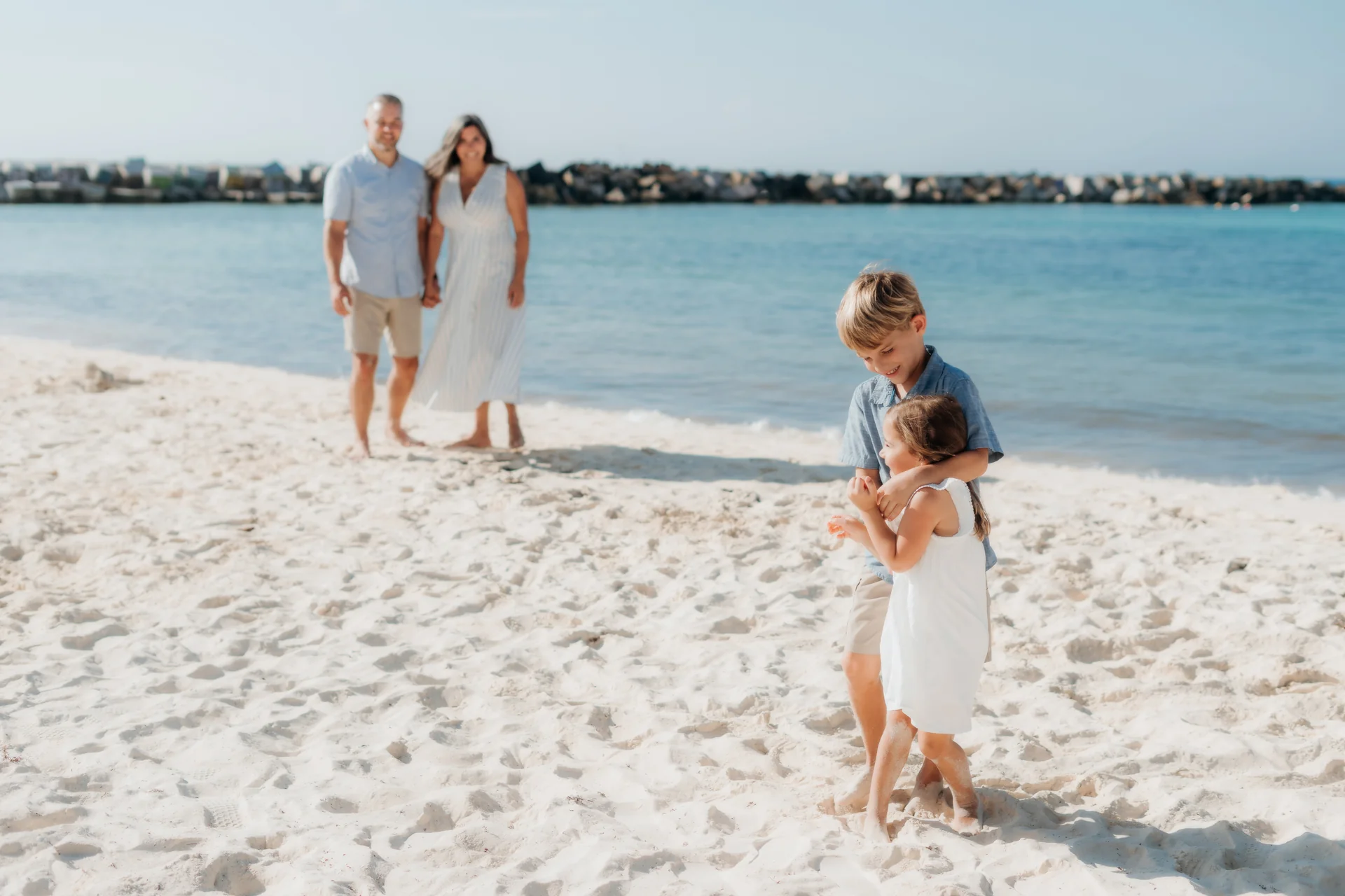Family gathered close for a group portrait, Hyatt Ziva, Cancún