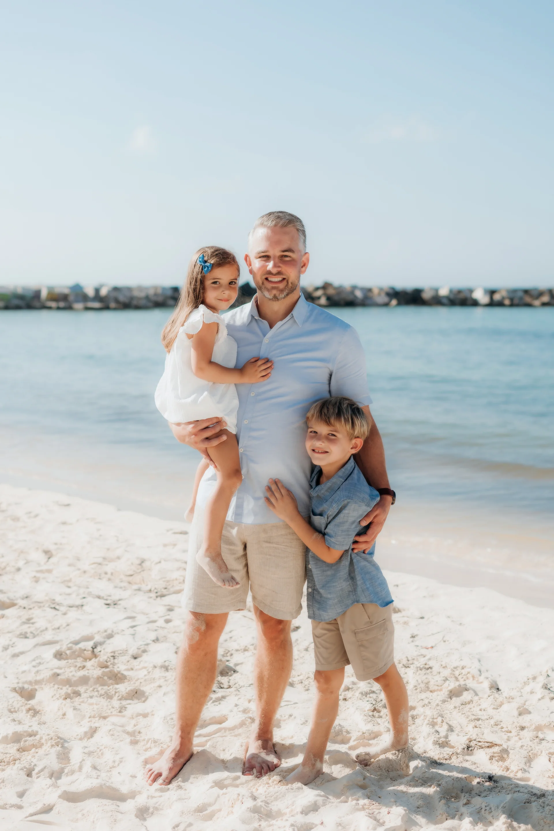 Family playing in the sand together, Hyatt Ziva, Cancún