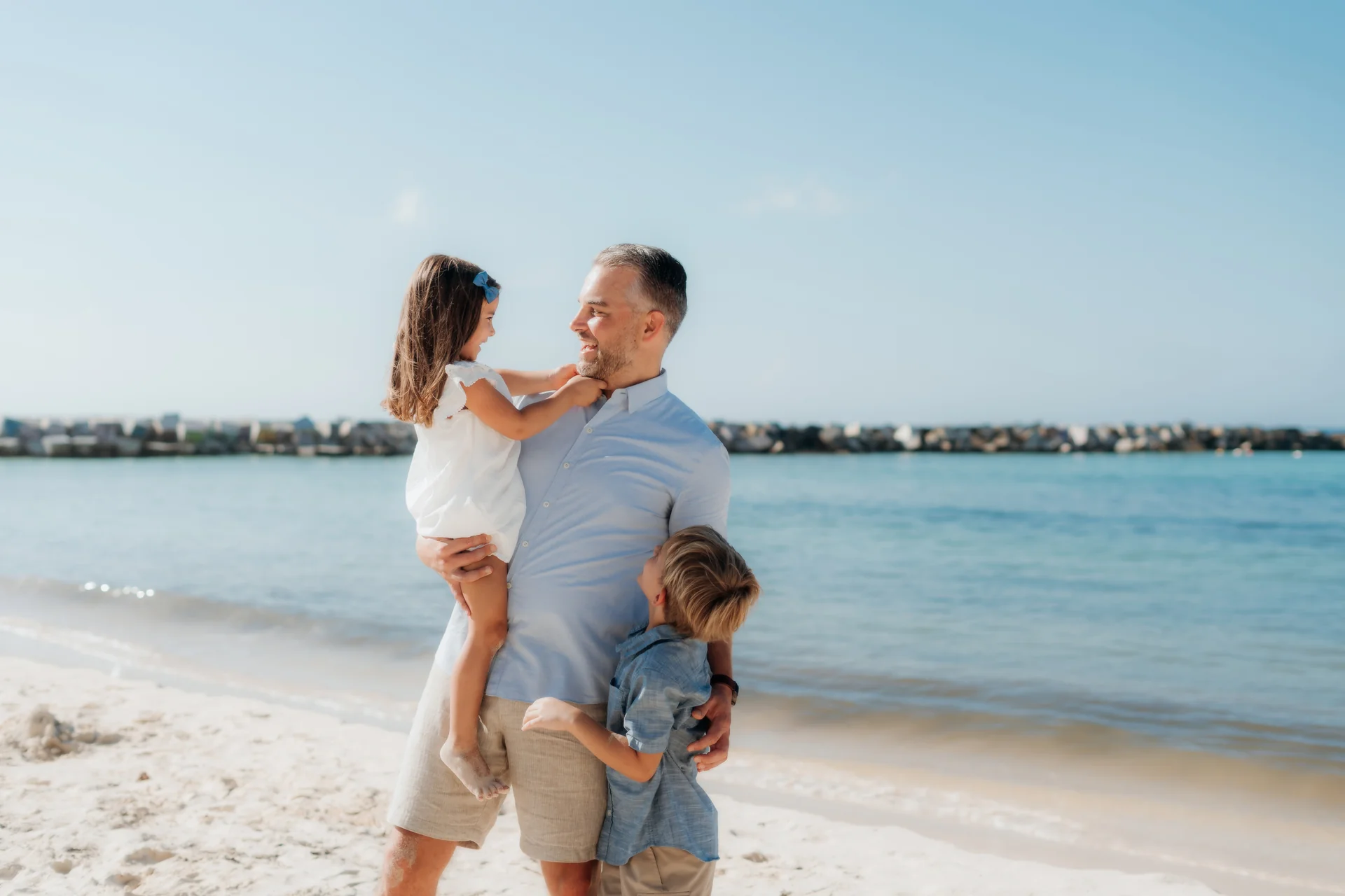 Father and child looking out at the sea, Hyatt Ziva, Cancún