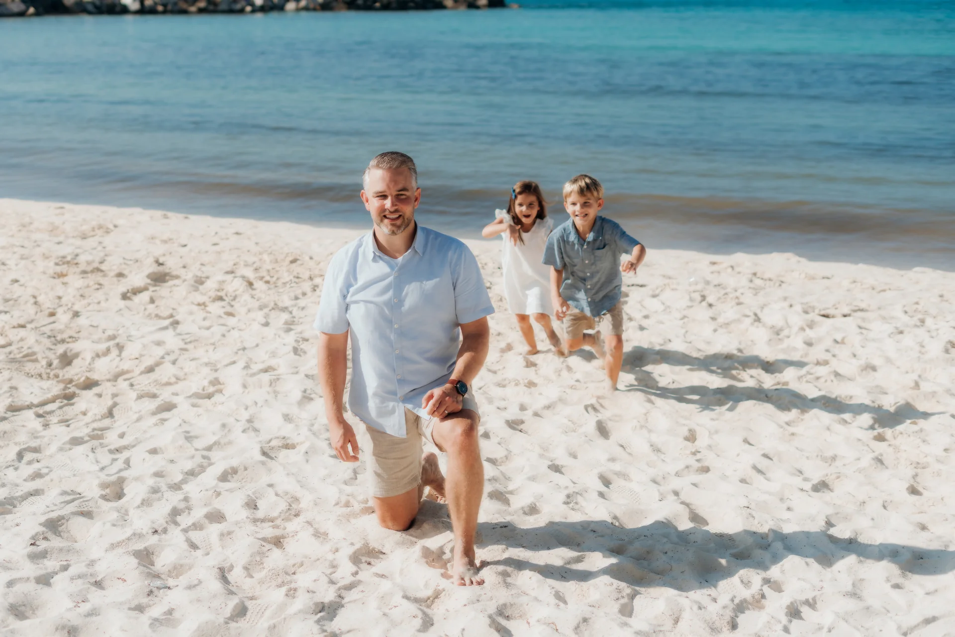 Family posing under the palms, Hyatt Ziva, Cancún
