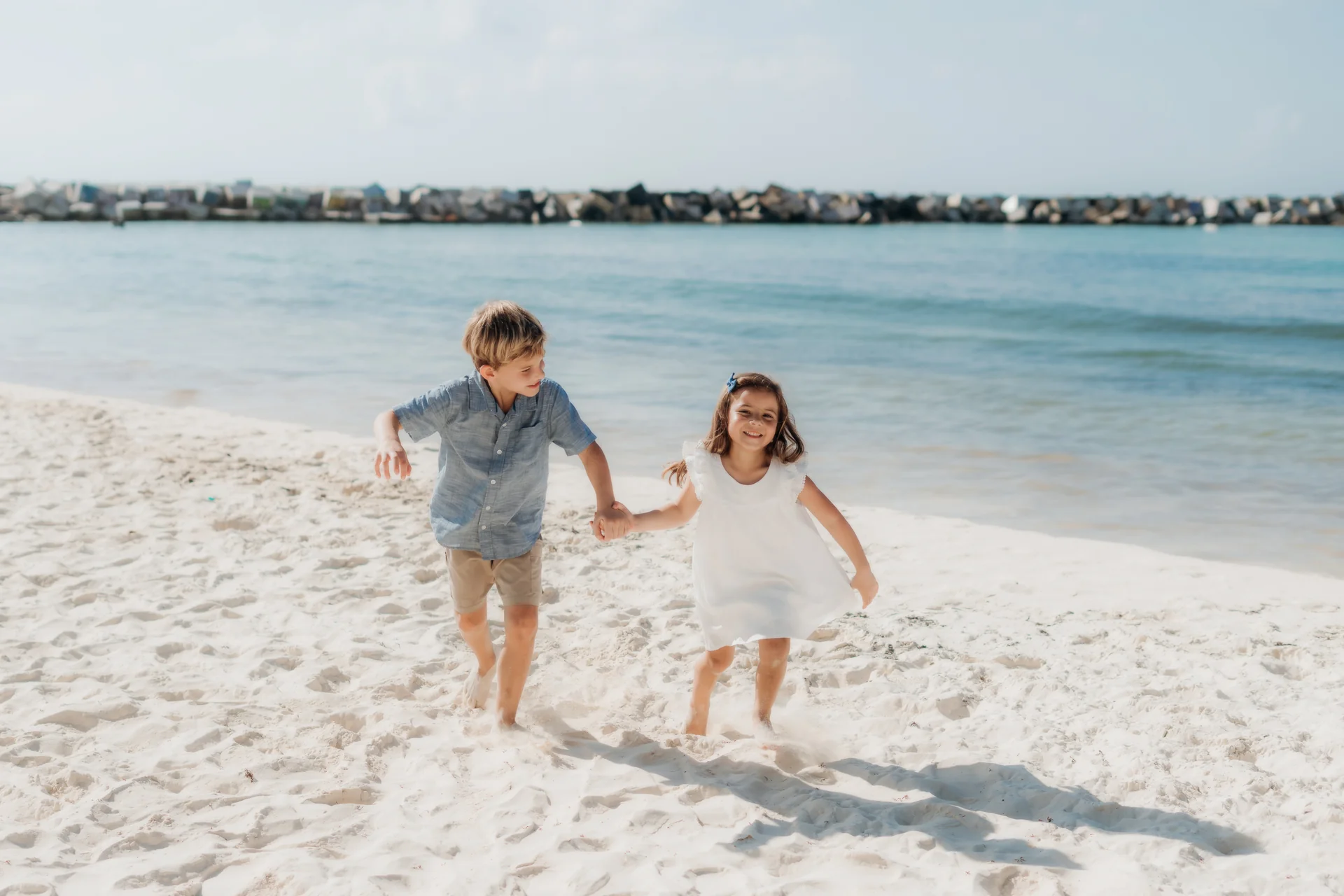 Child reaching up for a parent's hand, Hyatt Ziva, Cancún
