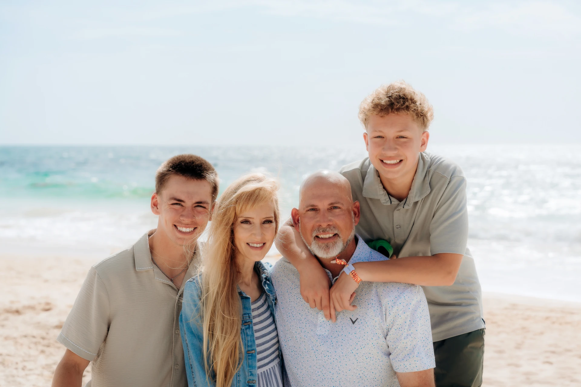 Family of four on a Playa del Carmen beach