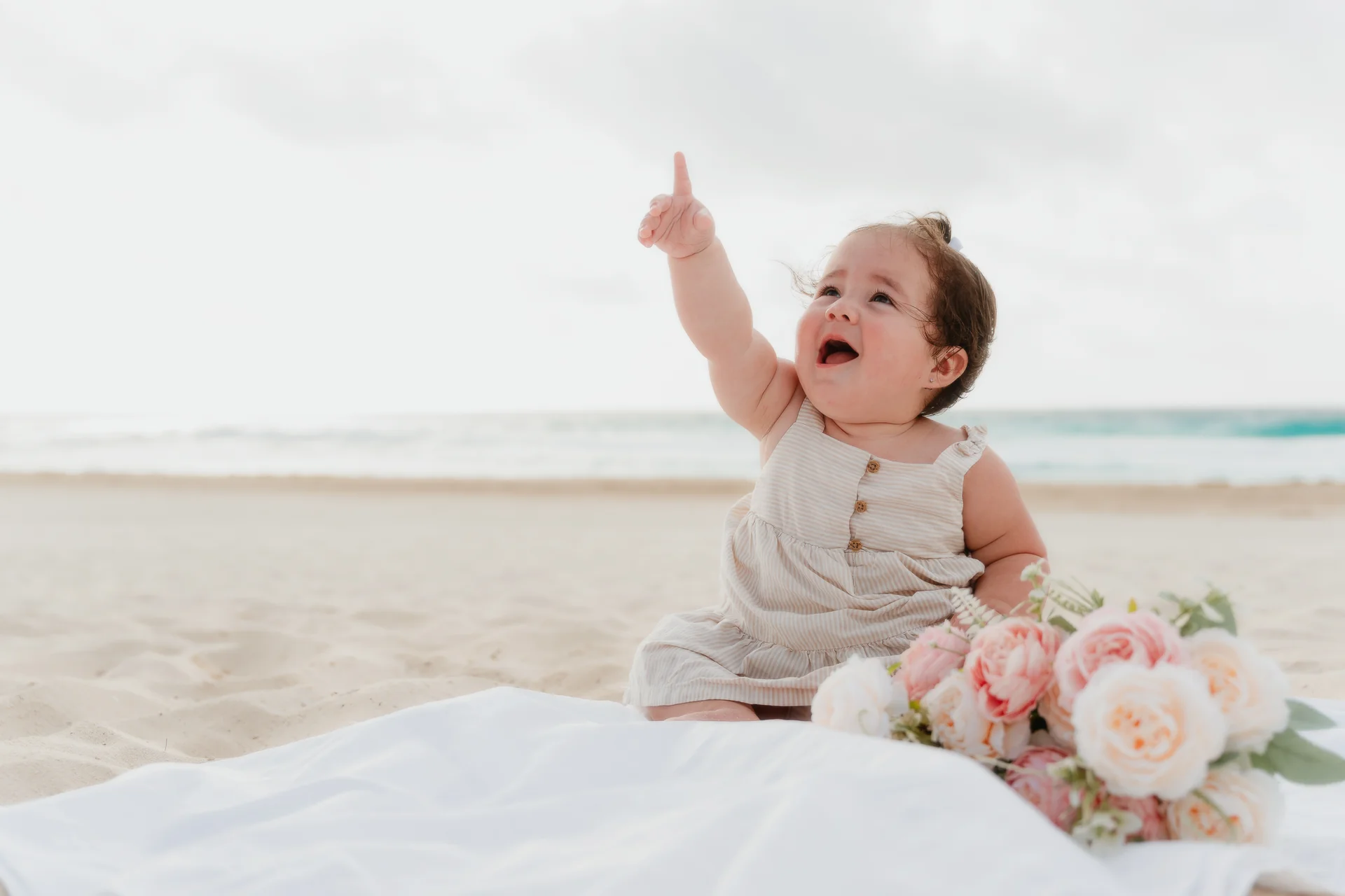 Mother and child sharing a quiet moment, Playa Delfines, Cancún