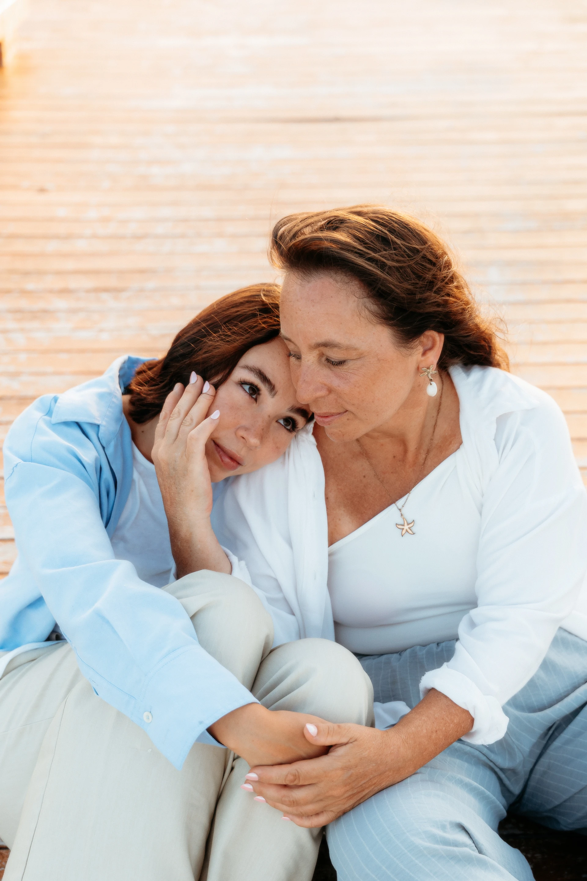 Mother and daughter on a dock in Puerto Aventuras