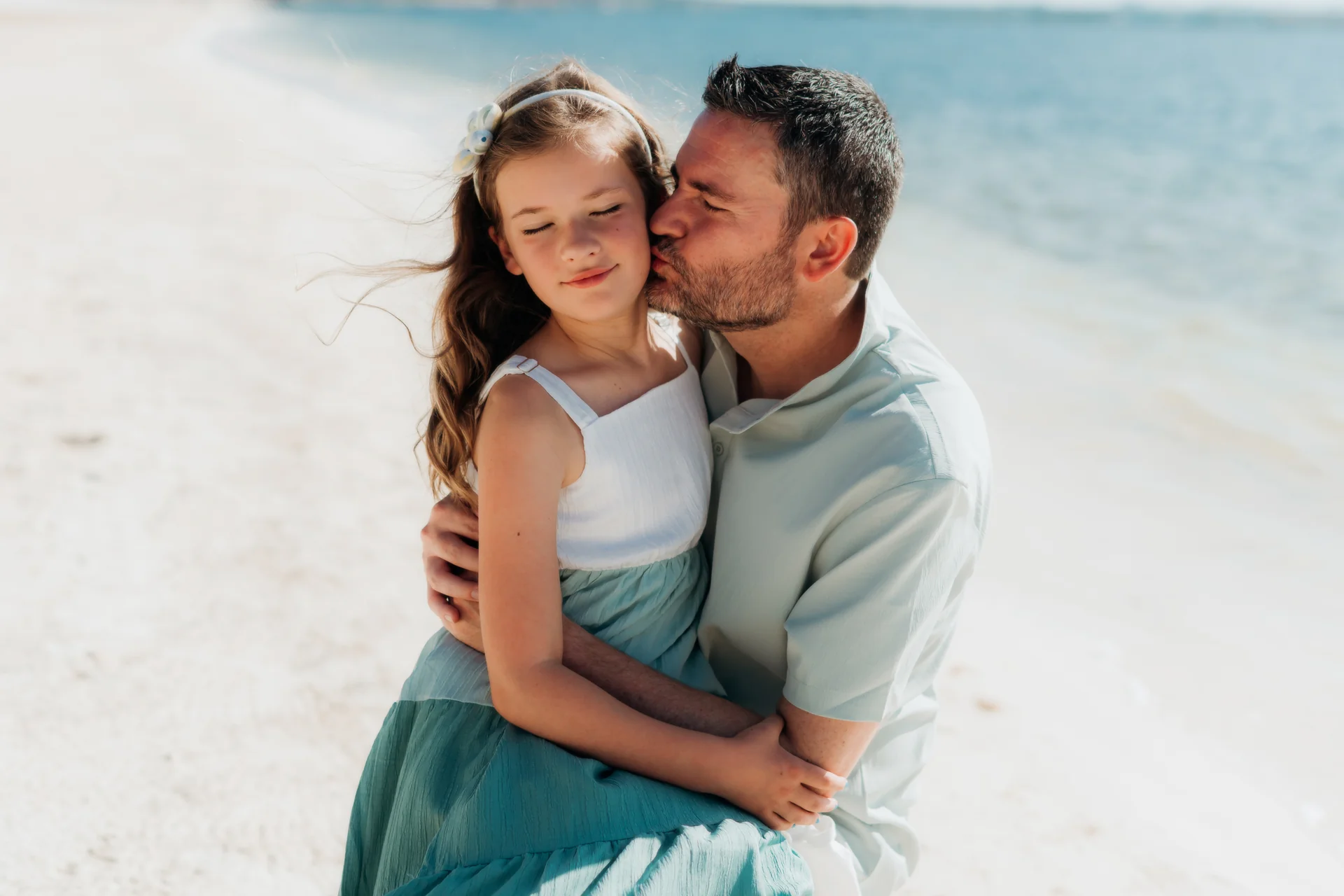 Candid family moment on the morning beach, Rosewood Mayakoba, Riviera Maya