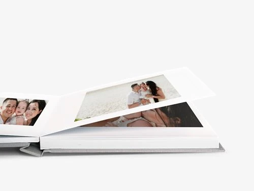 Open lay-flat album with a Roots wedding spread