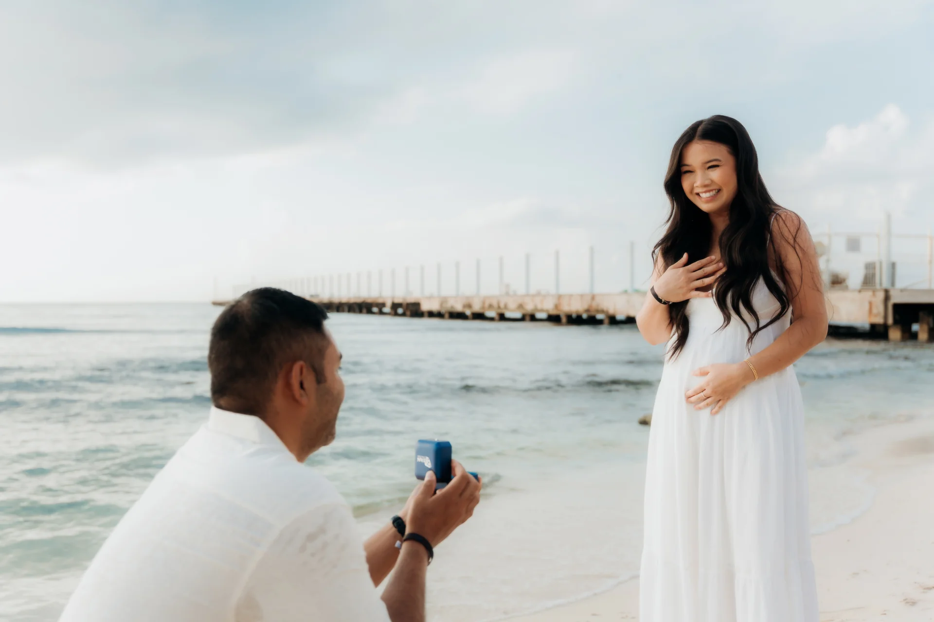 Couple walking the shoreline after the proposal, Hyatt Vivid, Playa del Carmen
