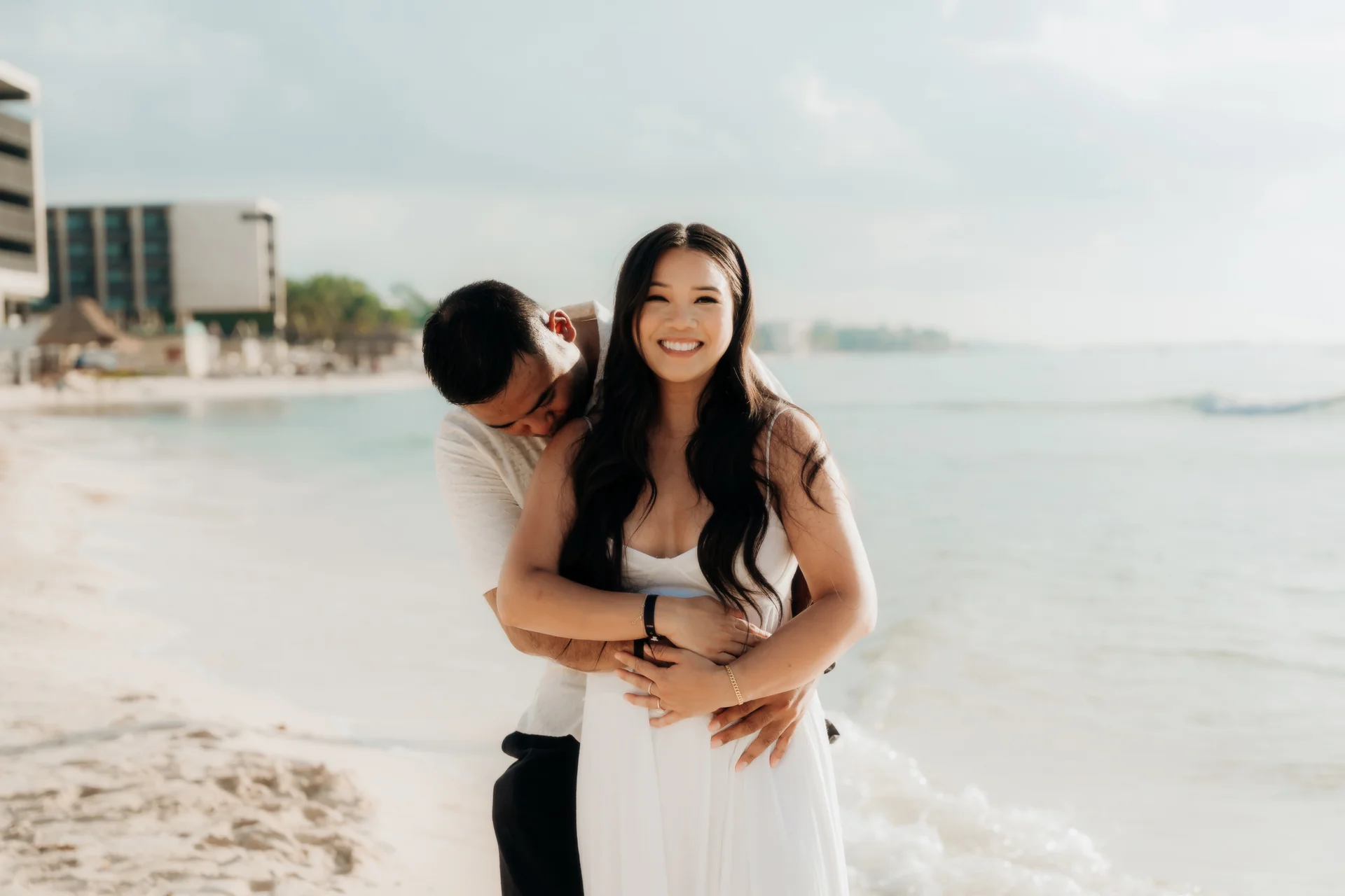 Newly engaged couple against the sea, Hyatt Vivid, Playa del Carmen