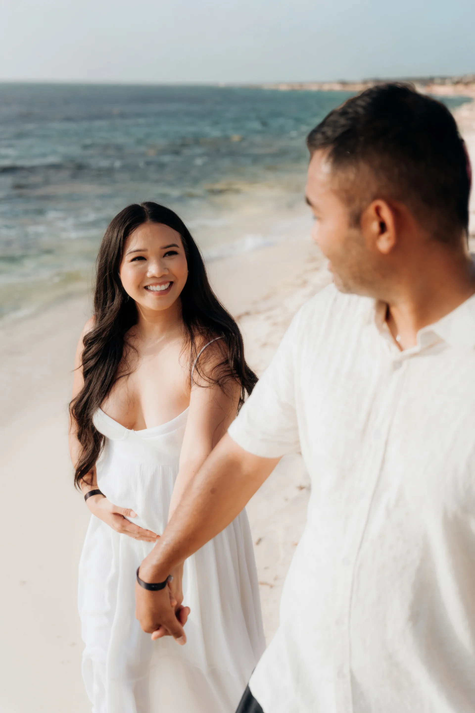 Engaged couple smiling at each other, Hyatt Vivid, Playa del Carmen