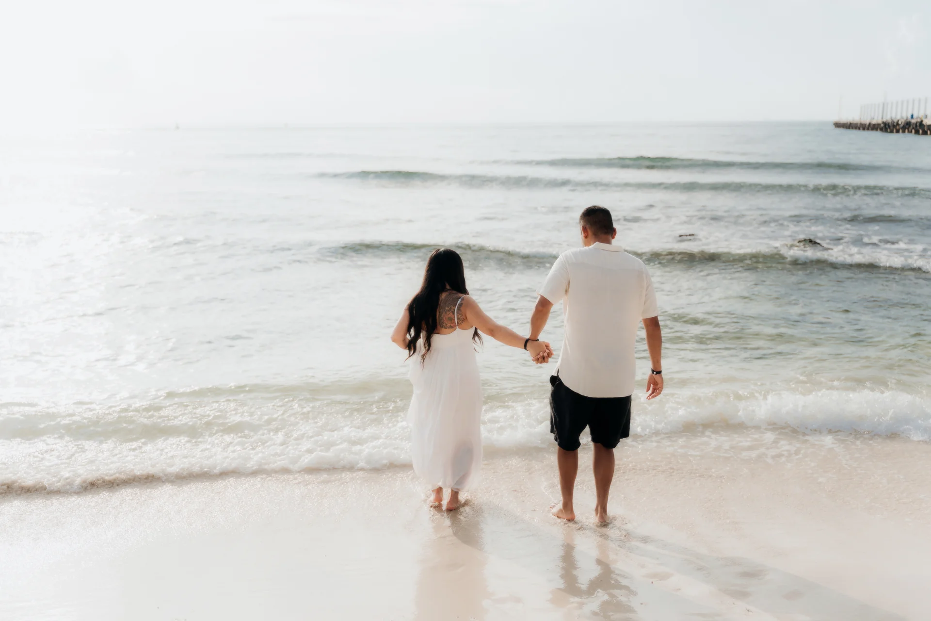 Engaged couple looking out at the sea, Hyatt Vivid, Playa del Carmen