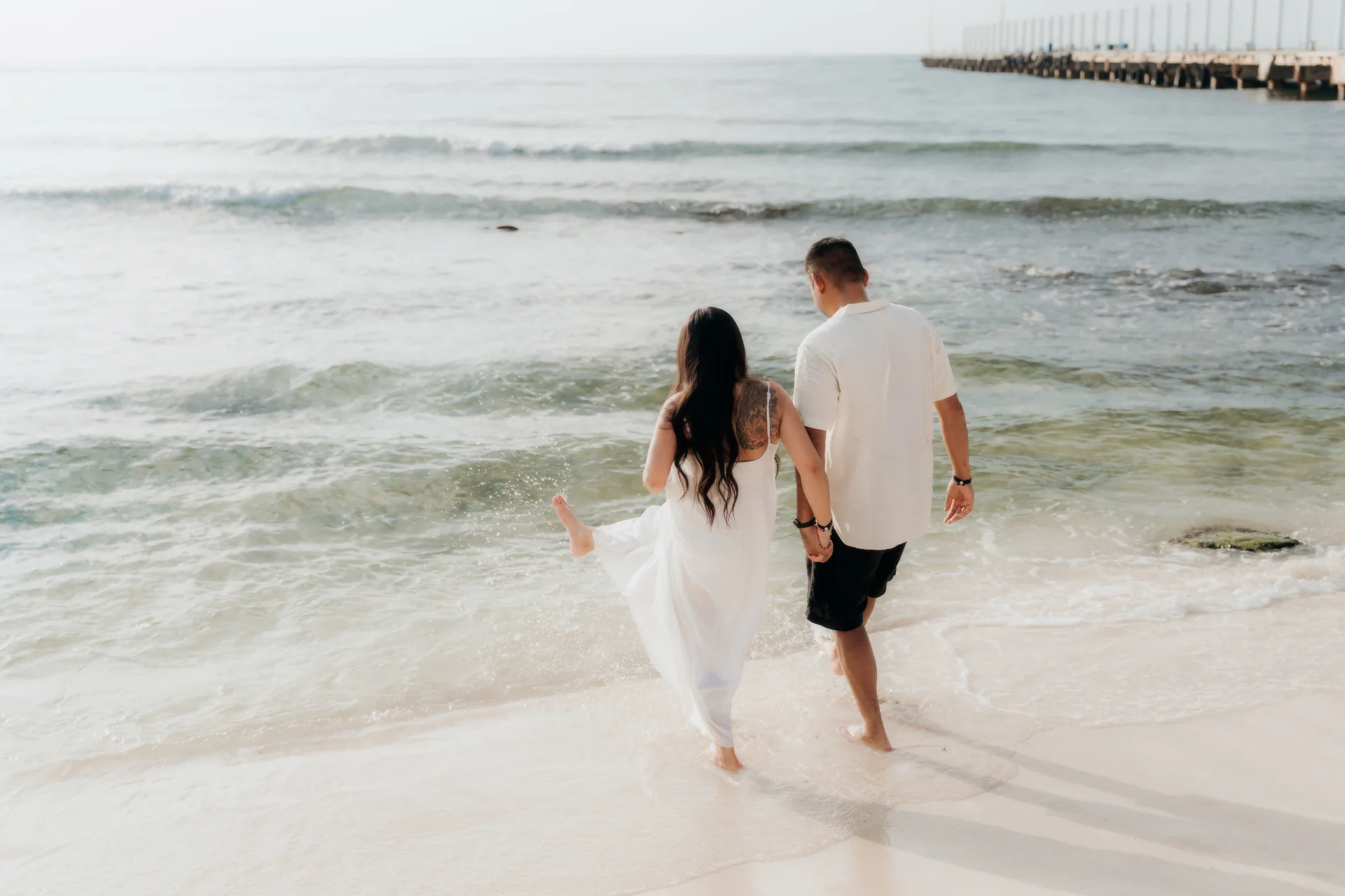 Couple kissing in the light after the proposal, Hyatt Vivid, Playa del Carmen