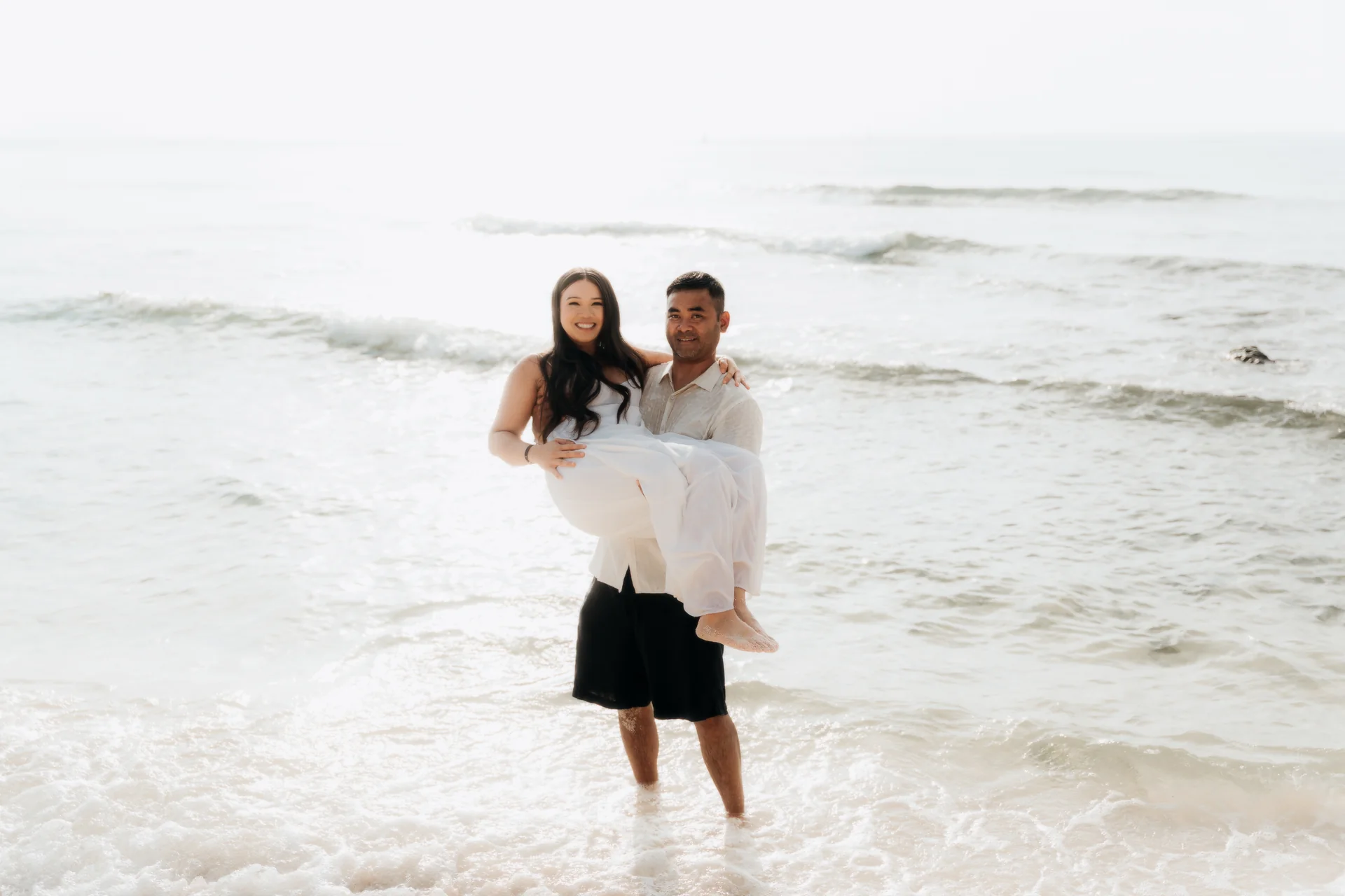 Newly engaged couple laughing on the sand, Hyatt Vivid, Playa del Carmen
