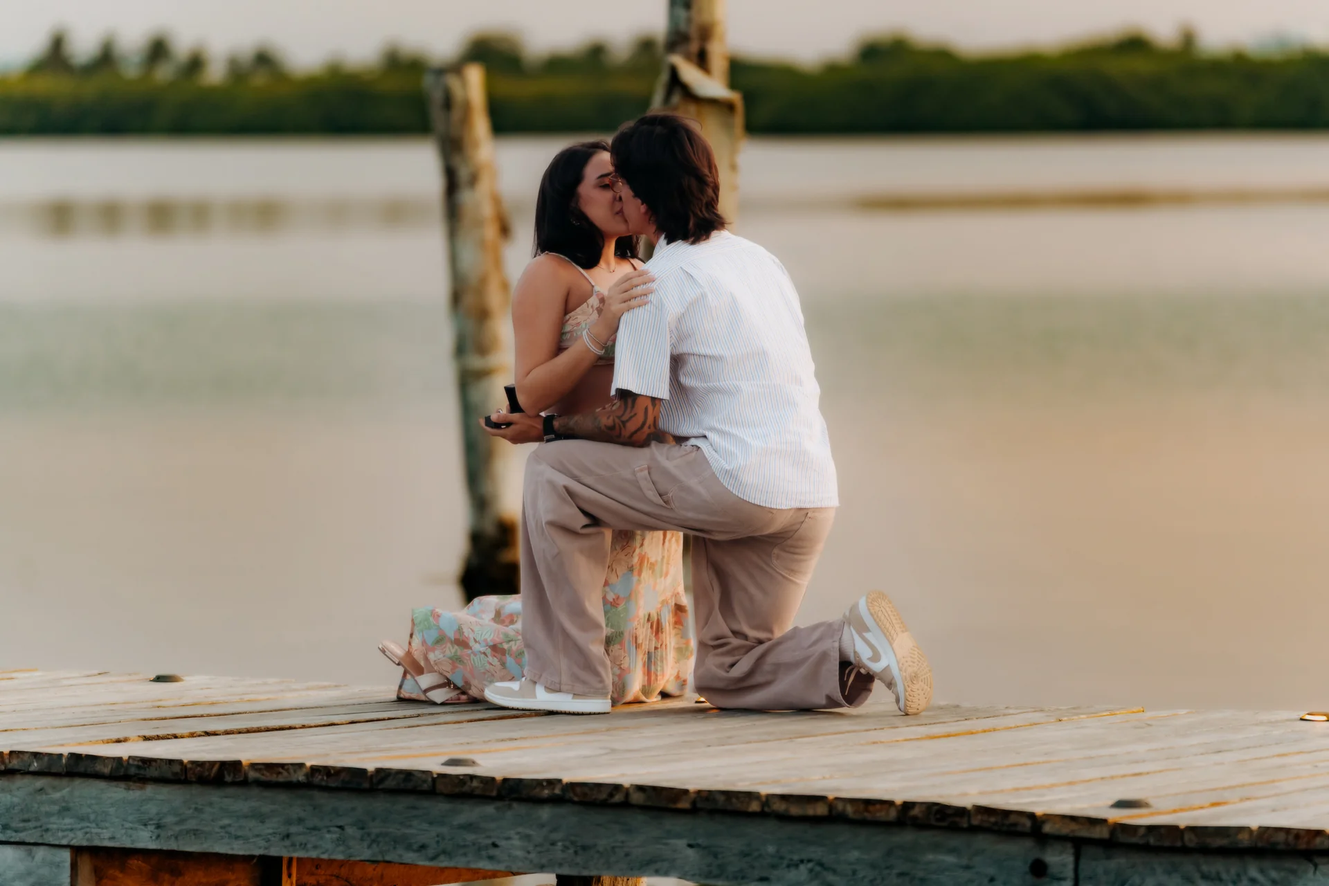 Couple sharing a laugh after the proposal, Navios restaurant, Cancún