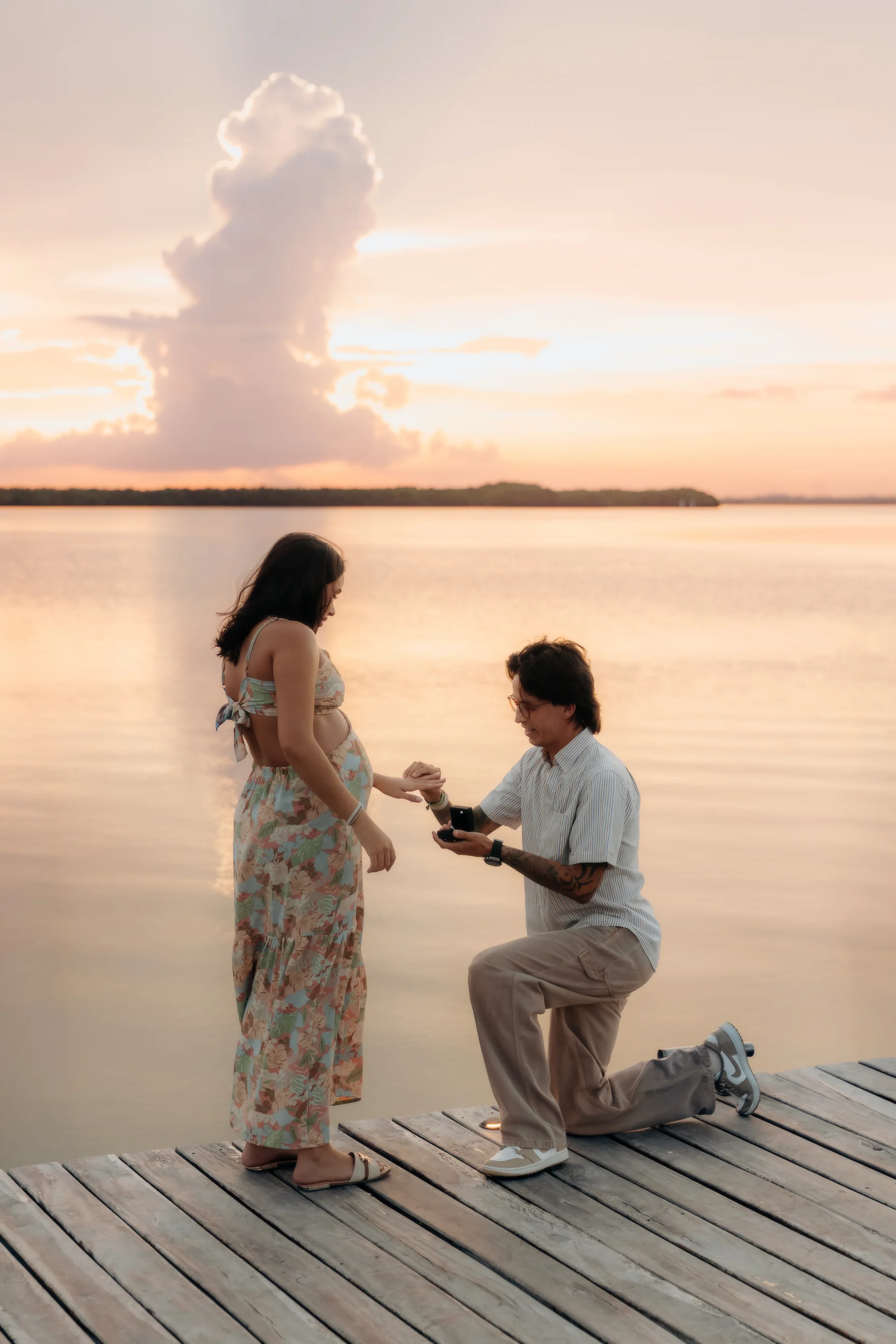 Couple standing together after the surprise, Navios restaurant, Cancún