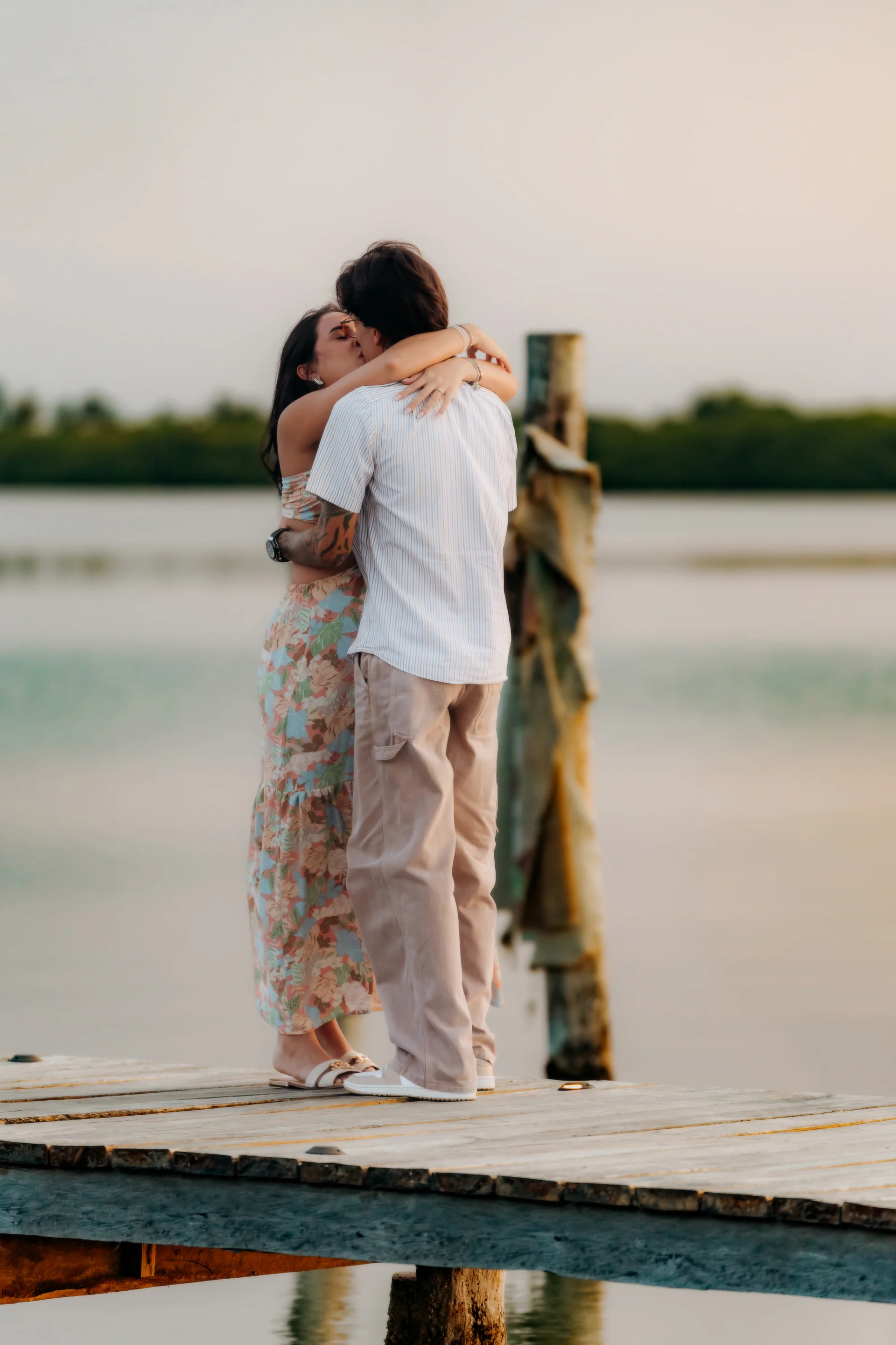 Couple holding the ring up together, Navios restaurant, Cancún