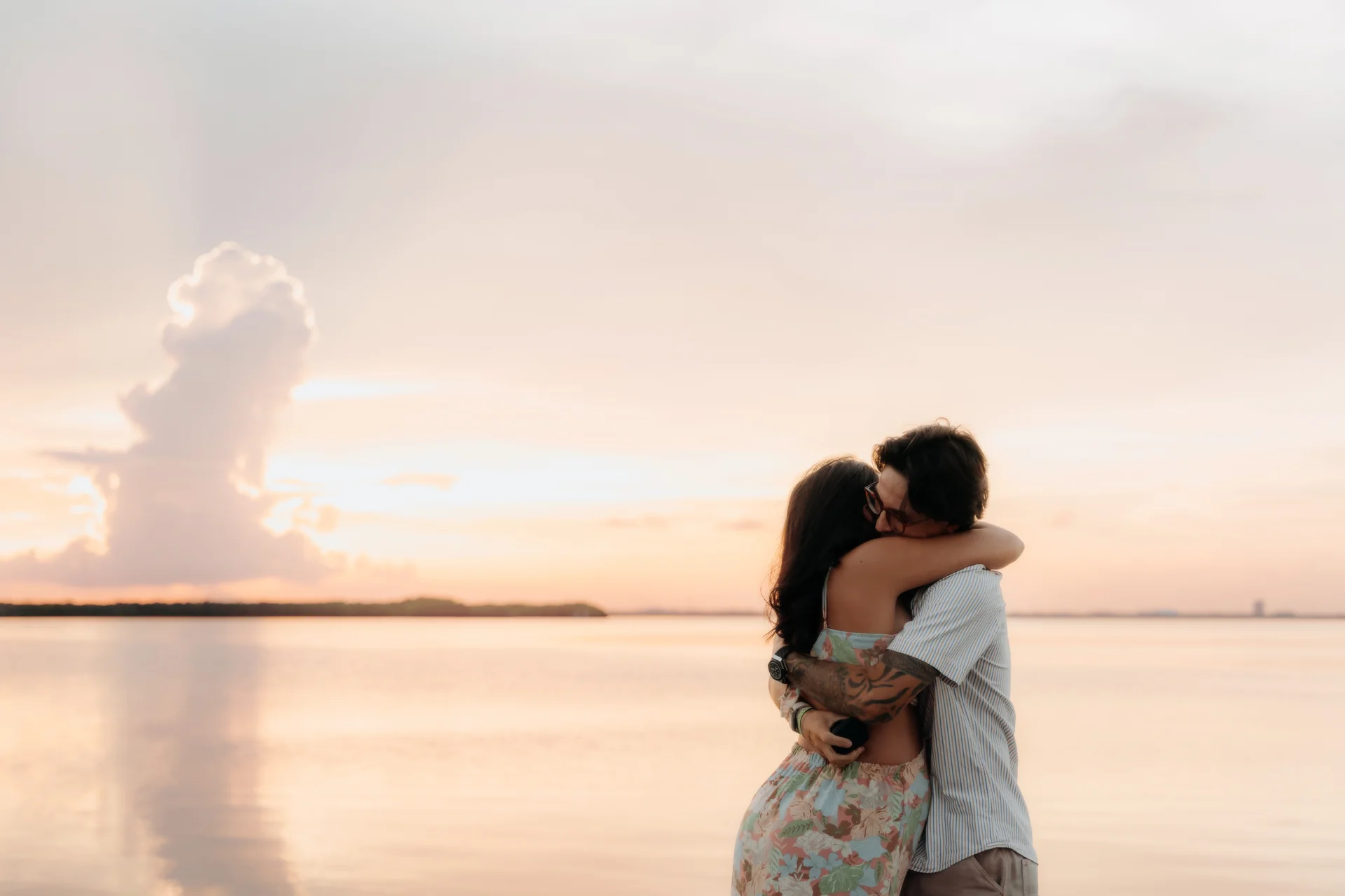 Couple celebrating on the empty beach, Navios restaurant, Cancún