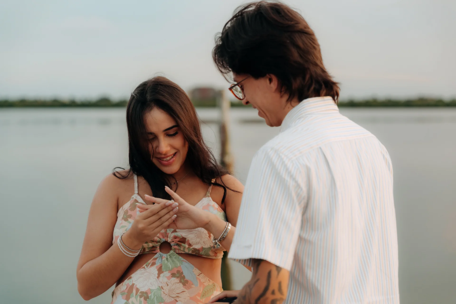 Couple silhouetted together after the proposal, Navios restaurant, Cancún